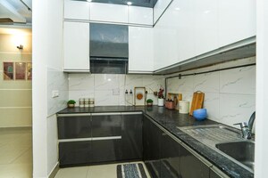 Kitchen in 3 BHK Apartment at Mahagun Mirabella, Sector 79 – for Rent