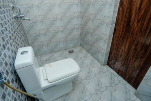 Bathroom in 3 BHK Apartment at Mahagun Mirabella, Sector 79 – for Rent