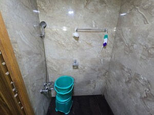 Bathroom in 3 BHK Apartment at Mahagun Mirabella, Sector 79 – for Rent