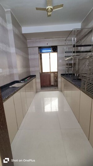 Kitchen in 3 BHK Apartment at Sunteck City Avenue 1, Goregaon West – for Rent