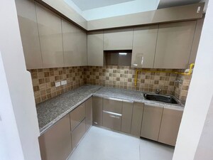 Kitchen in 2 BHK Apartment at Amrapali Golf Homes, Sector 4 Greater Noida – for Rent