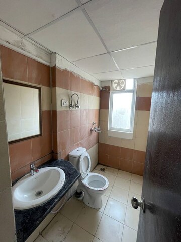 Bathroom in 2 BHK Apartment at Amrapali Golf Homes, Sector 4 Greater Noida – for Rent