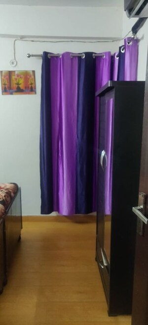 Living Room in 2.5 BHK Apartment at Amrapali Golf Homes, Sector 4 Greater Noida – for Rent