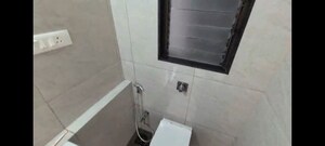 Bathroom in 2 BHK Apartment at Chandak 34 Park Estate, Goregaon West – for Rent