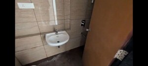 Bathroom in 2 BHK Apartment at Chandak 34 Park Estate, Goregaon West – for Rent