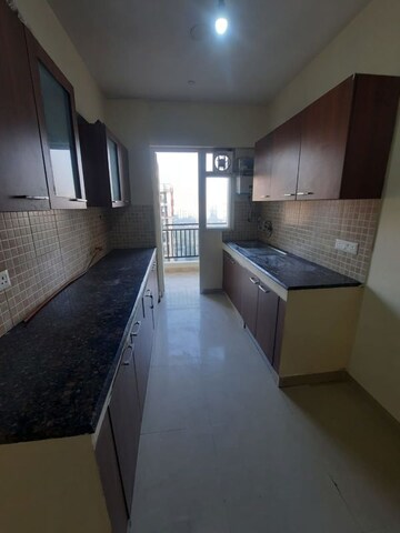 Kitchen in 3 BHK Apartment at Sethi Max Royal, Sector 76 – for Rent