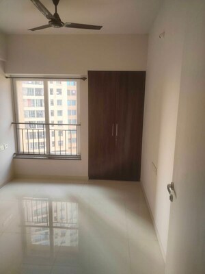 Room in 2 BHK Apartment at Rustomjee Azziano Wing D, Thane West – for Rent