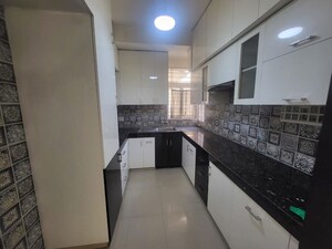 Kitchen in 3 BHK Apartment at Dhoot Time Residency, Sector 63 – for Rent