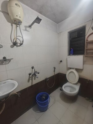 Bathroom in 2 BHK Apartment at Seawoods Sector 50 – for Rent