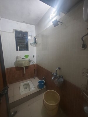 Bathroom in 2 BHK Apartment at Seawoods Sector 50 – for Rent