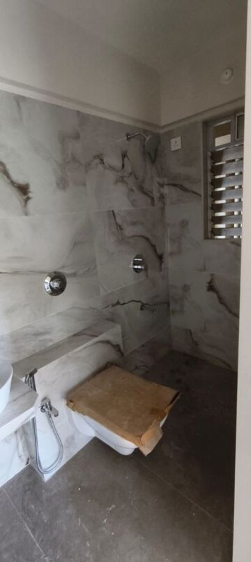Bathroom in 2 BHK Apartment at Omkara Unchai, Borivali West – for Sale