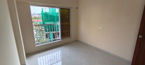 Room in 2 BHK Apartment at Omkara Unchai, Borivali West – for Sale