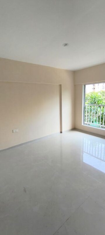 Room in 2 BHK Apartment at Omkara Unchai, Borivali West – for Sale