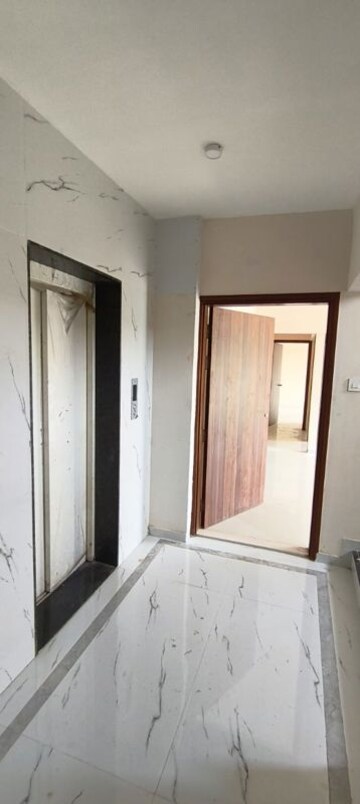 Building Lobby in 2 BHK Apartment at Omkara Unchai, Borivali West – for Sale