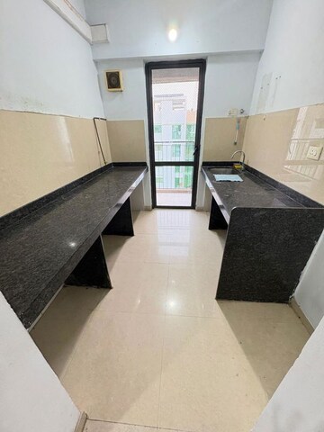 Kitchen in 2 BHK Apartment at Lodha Lakeshore Greens, Dombivli East – for Rent