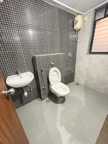 Bathroom in 2 BHK Apartment at Lodha Lakeshore Greens, Dombivli East – for Rent