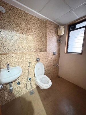 Bathroom in 2 BHK Apartment at Lodha Lakeshore Greens, Dombivli East – for Rent