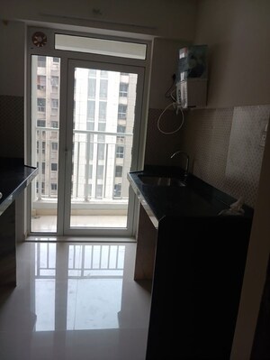 Kitchen in 1 BHK Apartment at Lodha Amara, Kolshet Road – for Rent