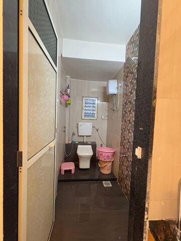 Bathroom in 2 BHK Apartment at Kalyan West – for Sale