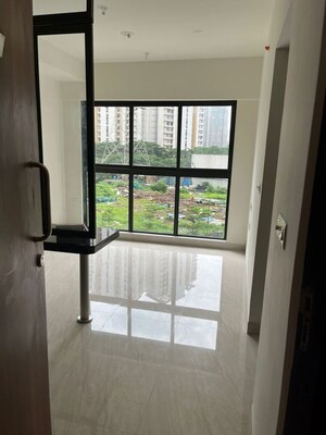 Living Room in 1 BHK Apartment at Lodha Crown Quality Homes, Majiwada – for Sale