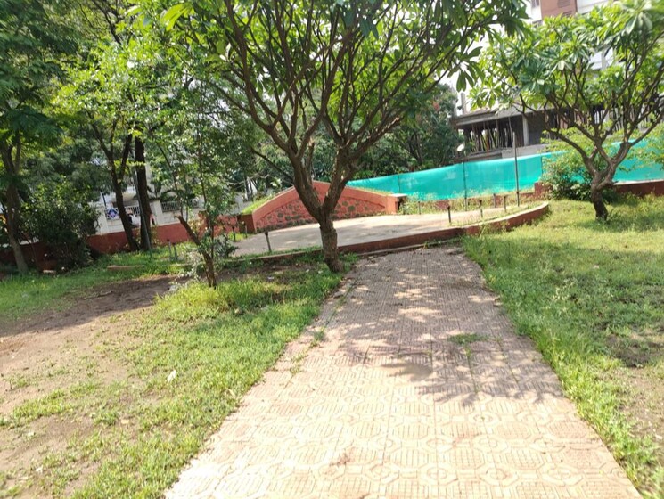 Garden, brahma-heights 2 Bedroom 717 Sq.Ft. Builder Floor In Wagholi Pune 9747333
