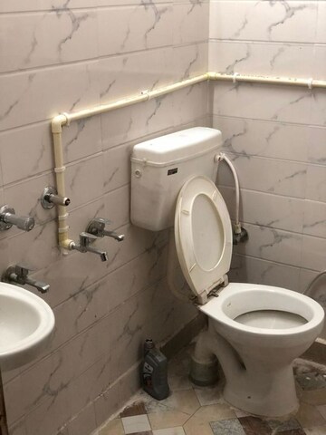 Bathroom in 1.5 BHK Builder Floor at Nawada – for Sale