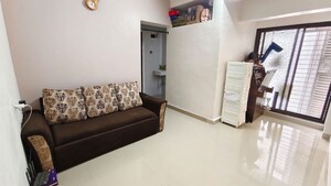 Living Room in 1 BHK Apartment at Majiwada – for Sale