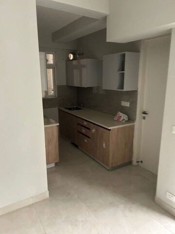 Kitchen in 2 BHK Apartment at Signature Global City, Sector 37d – for Rent