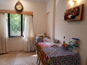 Living Room in 1 BHK Apartment at Bandra West – for Rent