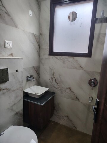 Bathroom in 3 BHK Builder Floor at Dhakoli – for Sale