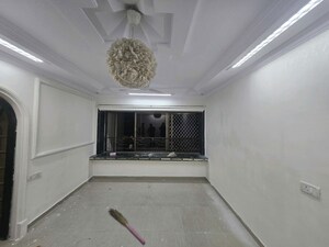 Living Room in 2 BHK Apartment at Andheri CHS, Andheri West – for Rent