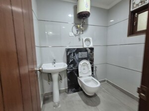 Bathroom in 1.5 BHK Builder Floor at Chattarpur – for Rent