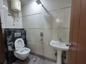 Bathroom in 2 BHK Builder Floor at Palm Residency Chhatarpur, Chattarpur – for Rent