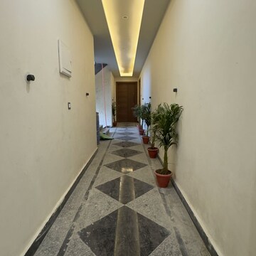 Building Lobby in 4 BHK Apartment at Palm Residency Chhatarpur, Rajpur Khurd Extension – for Sale