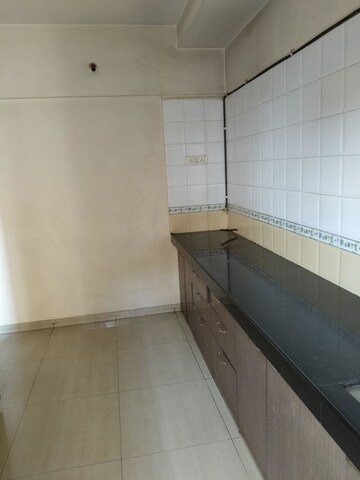 Kitchen in 3 BHK Apartment at Kesar Gardens, Kharghar – for Rent