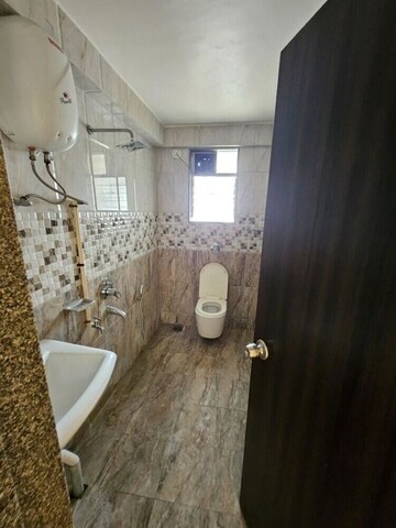 Bathroom in 3 BHK Apartment at Saakshi Parvasaakshi, Pimple Saudagar – for Rent