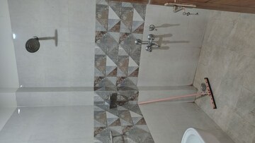 Bathroom in 3 BHK Apartment at Metro Suites Glitz, Vasundhara Sector 2 – for Rent