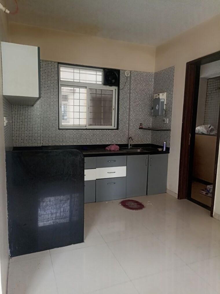 Kitchen, fortune-associates-aristolia 2 Bedroom 1019 Sq.Ft. Apartment In Hadapsar Pune 9672798