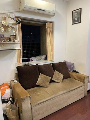 Living Room in 1 BHK Apartment at Lady Ratan Tower, Worli – for Rent