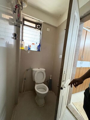 Bathroom in 1 BHK Apartment at Raunak Bliss, Ghodbunder Road – for Rent