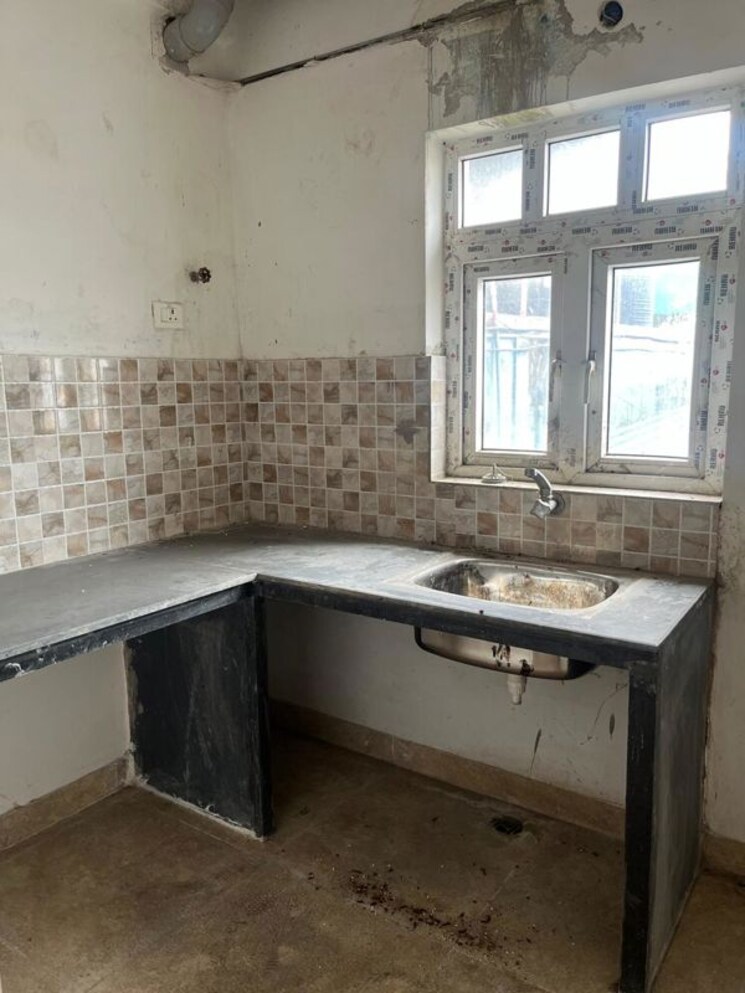 Kitchen, chinar park 2 Bedroom 810 Sq.Ft. Apartment In Chinar Park Kolkata 9761893