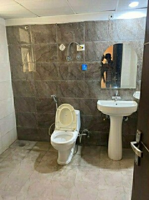 Bathroom in 1 BHK Apartment at VVIP Nest, Raj Nagar Extension – for Rent