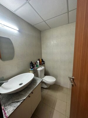 Bathroom in 2 BHK Apartment at Bhartiya Nikoo Homes, Thanisandra Main Road – for Rent