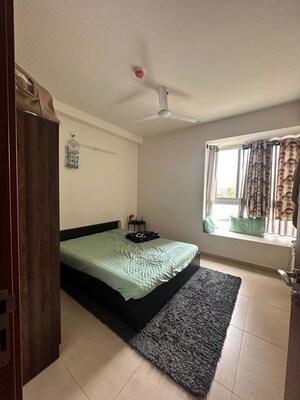 Bedroom in 2 BHK Apartment at Bhartiya Nikoo Homes, Thanisandra Main Road – for Rent