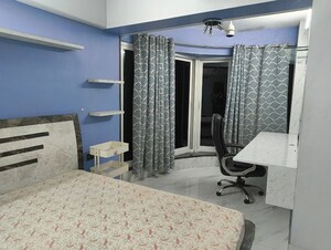 Living Room in 2 BHK Apartment at The Wadhwa Palm Beach Residency, Nerul Sector 4 – for Rent
