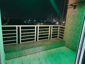 Balcony in 2 BHK Apartment at The Wadhwa Palm Beach Residency, Nerul Sector 4 – for Rent