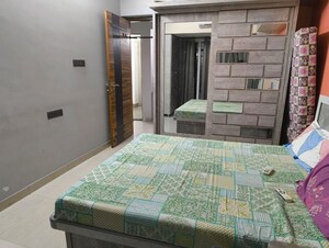 Bedroom in 2 BHK Apartment at The Wadhwa Palm Beach Residency, Nerul Sector 4 – for Rent