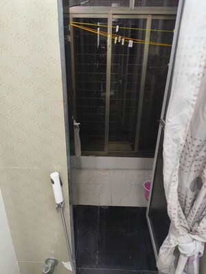 Bathroom in 2 BHK Apartment at The Wadhwa Palm Beach Residency, Nerul Sector 4 – for Rent