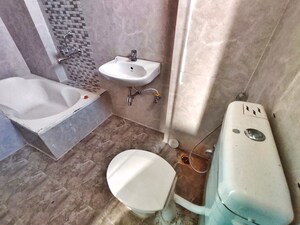 Bathroom in 3 BHK Apartment at HRT Lake View, Kasarsai – for Rent
