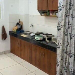 Kitchen in 1 RK Apartment at DLF City Phase III, Sector 24 – for Rent